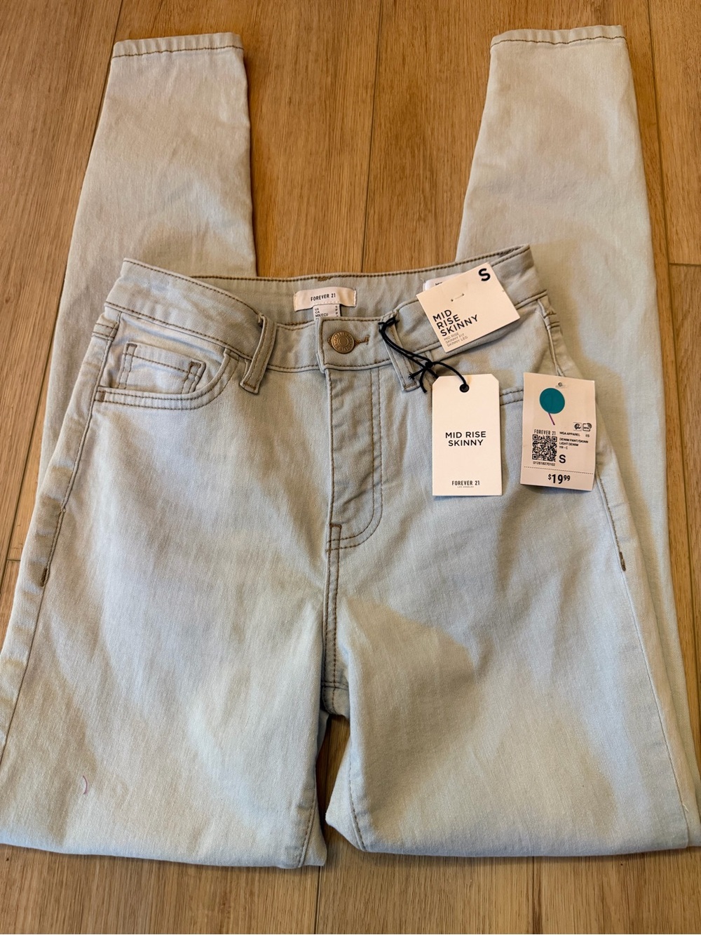 Forever 21 Light Wash Mid Rise Skinny Jeans